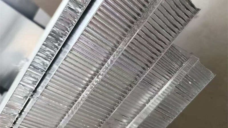 Lightweight aluminum honeycomb panel installed as interior wall paneling in a train, made in China.